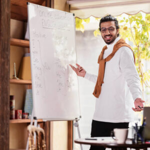 happy-indian-teacher-having-online-lecture-via-vid-2021-09-01-16-39-23-utc.jpg